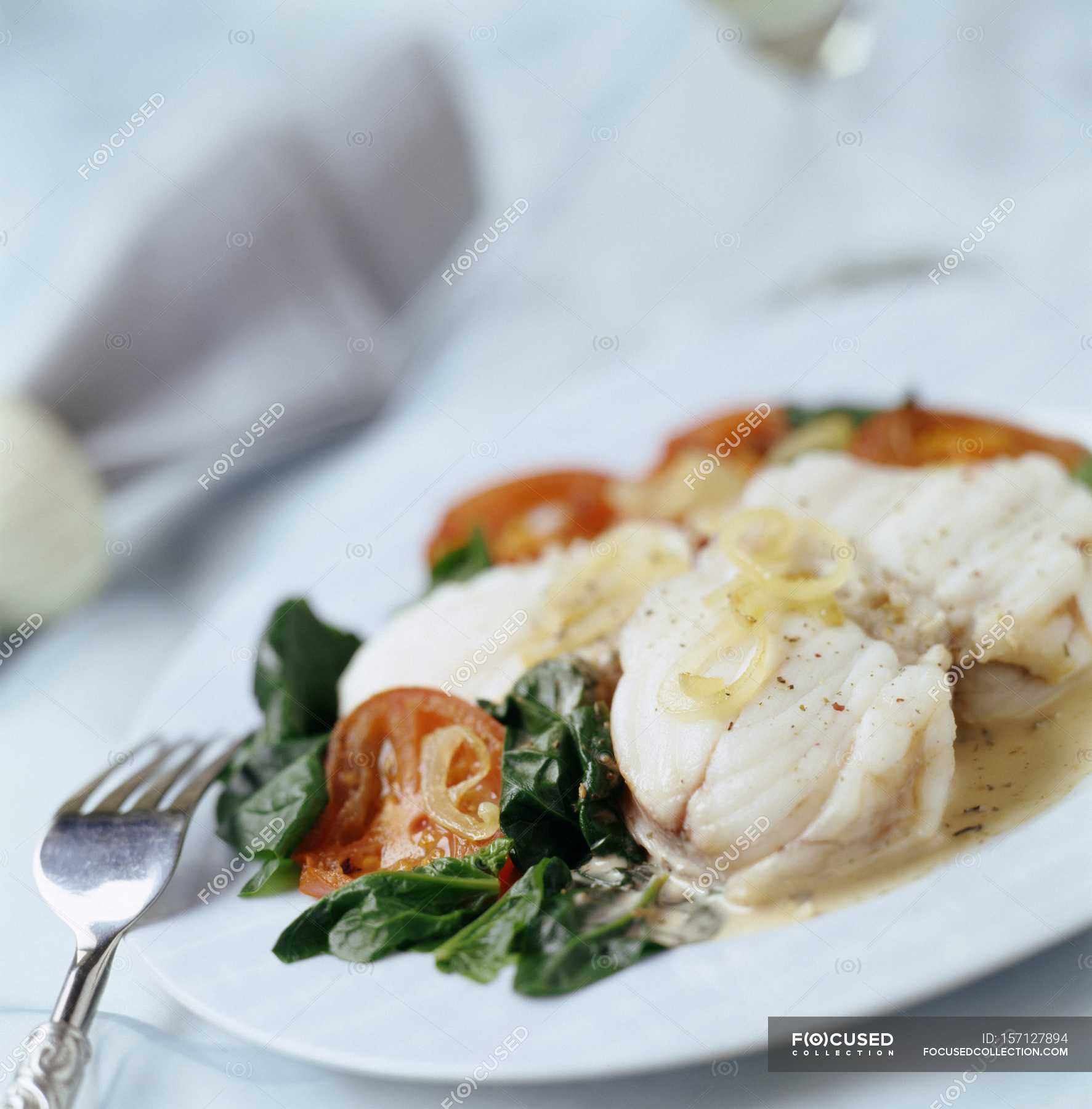Monkfish in creamy lemon sauce — plate, cuisine - Stock Photo | #157127894