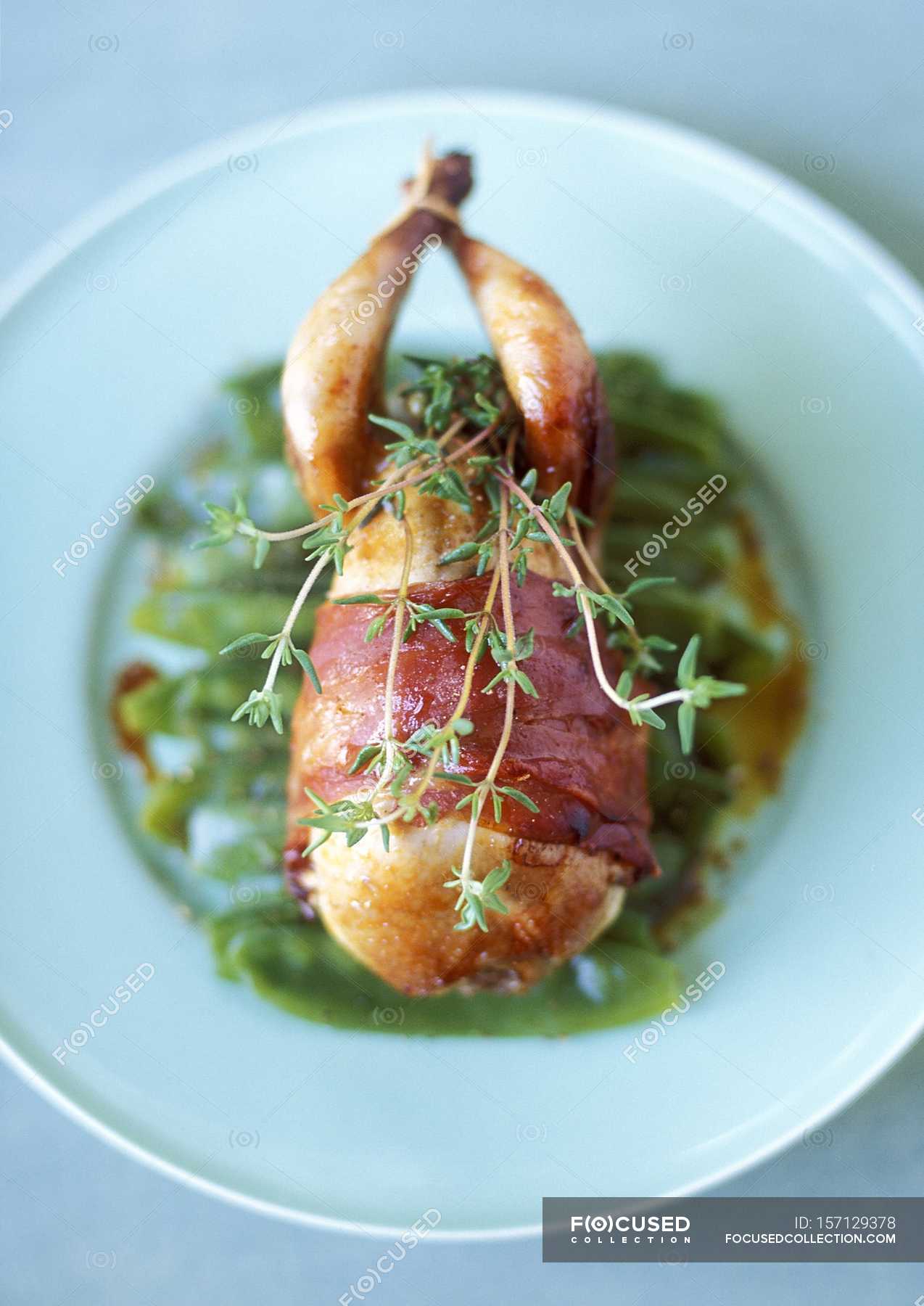 Quail wrapped in bacon — organic, taste - Stock Photo | #157129378