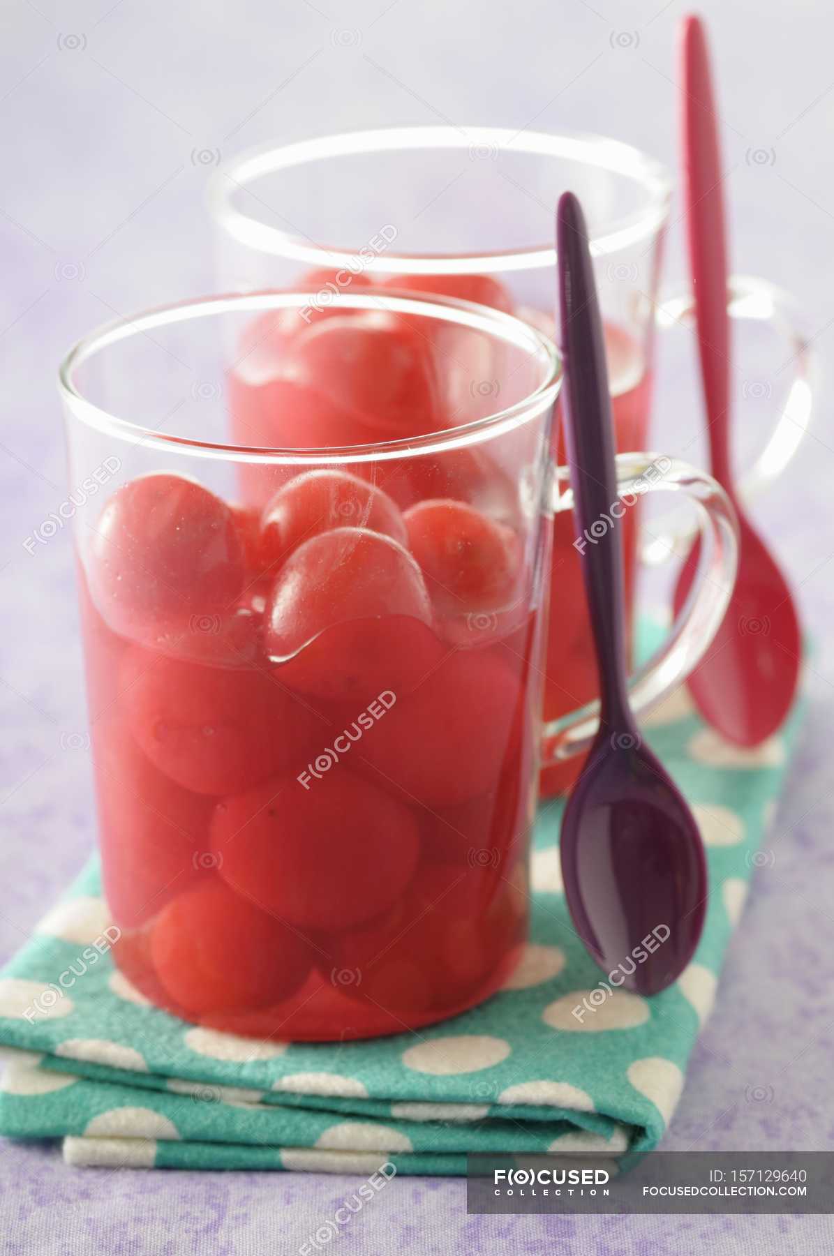 Cherries in syrup in glasses — gourmet, nutrition Stock Photo