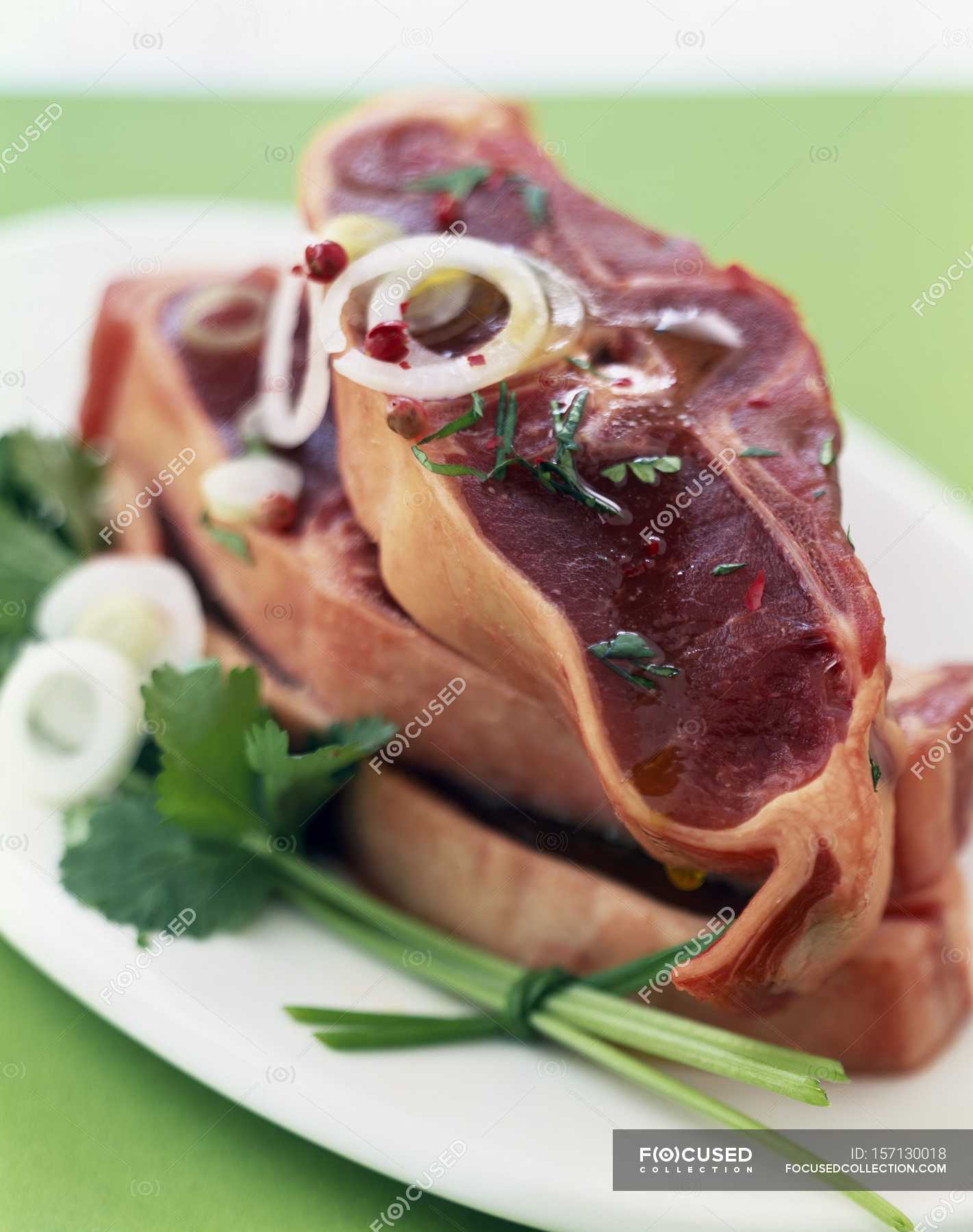 Raw lamb chops — rib bones, cutlets - Stock Photo | #157130018