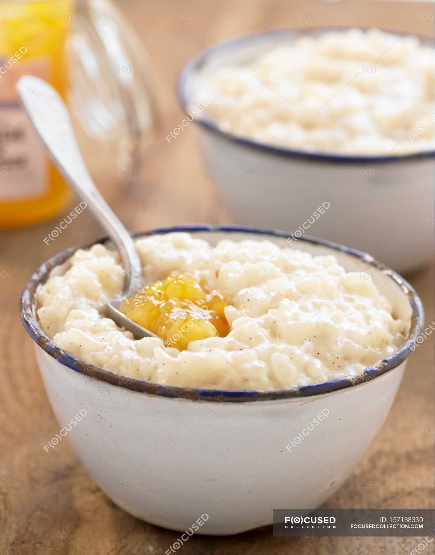 Rice pudding with apricot jam — tasty, cooking Stock Photo 157138330