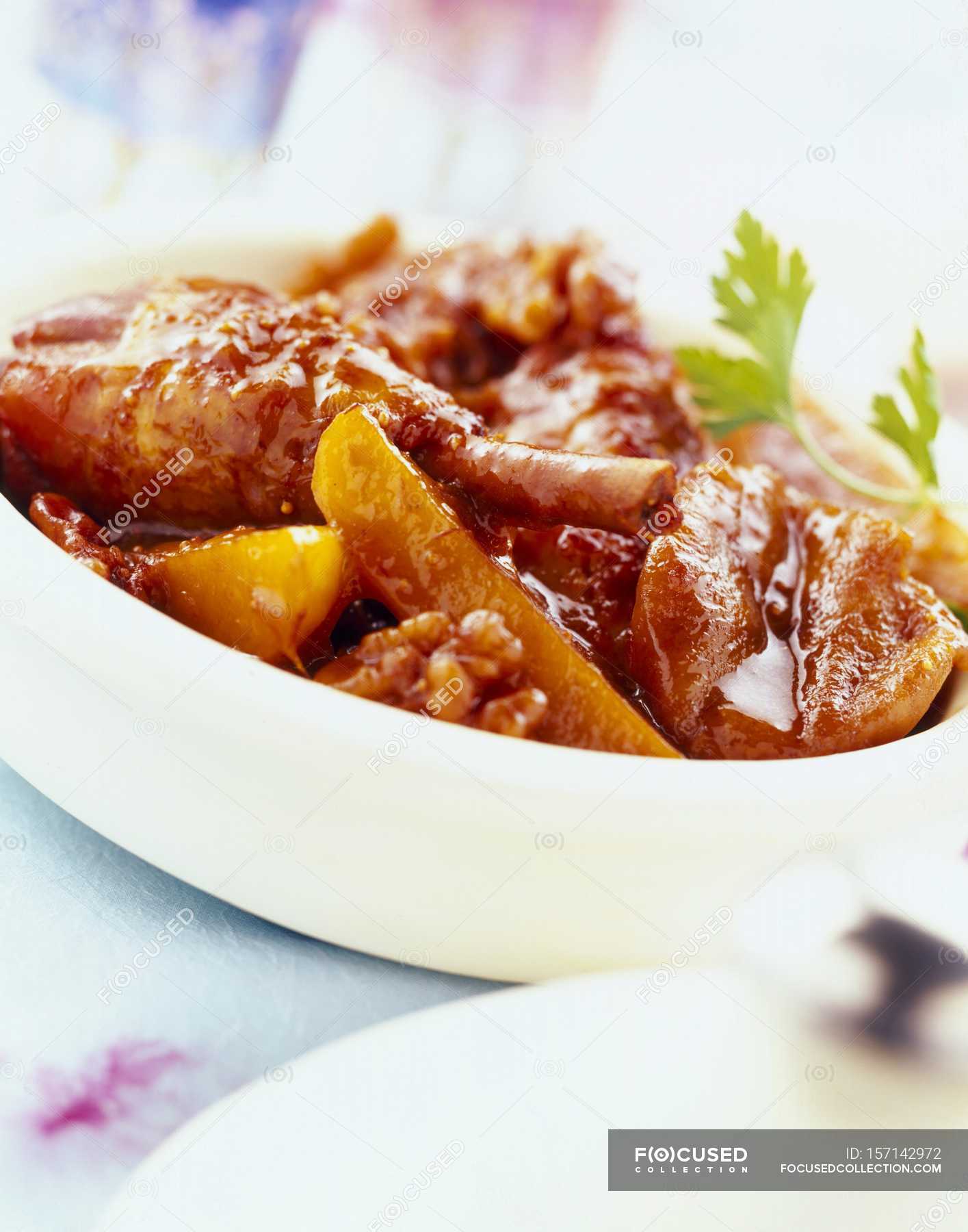Chicken tajine with figs — traditional, background Stock Photo