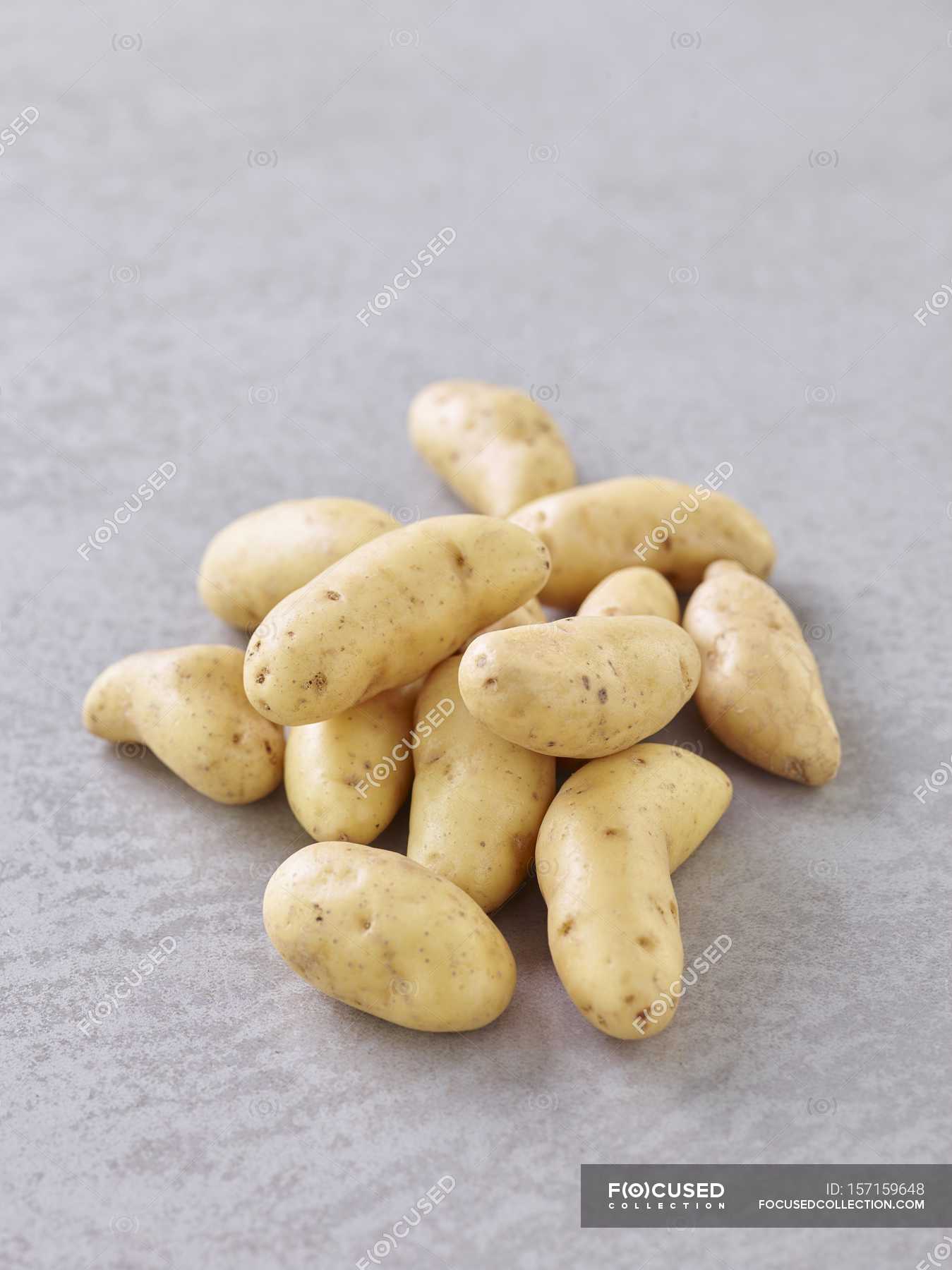 Heap of fresh raw Potato — tasty, unprocessed Stock Photo 157159648