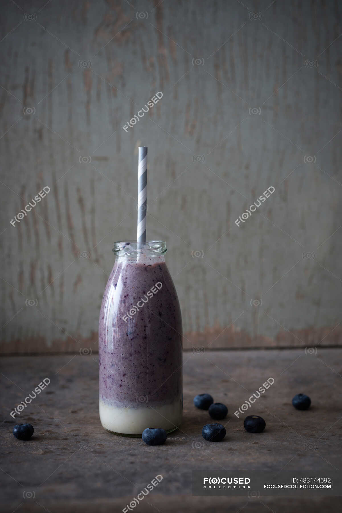 Vegan cashew nut and blueberry smoothie in a glass bottle — healthy food,  copy space - Stock Photo | #483144692