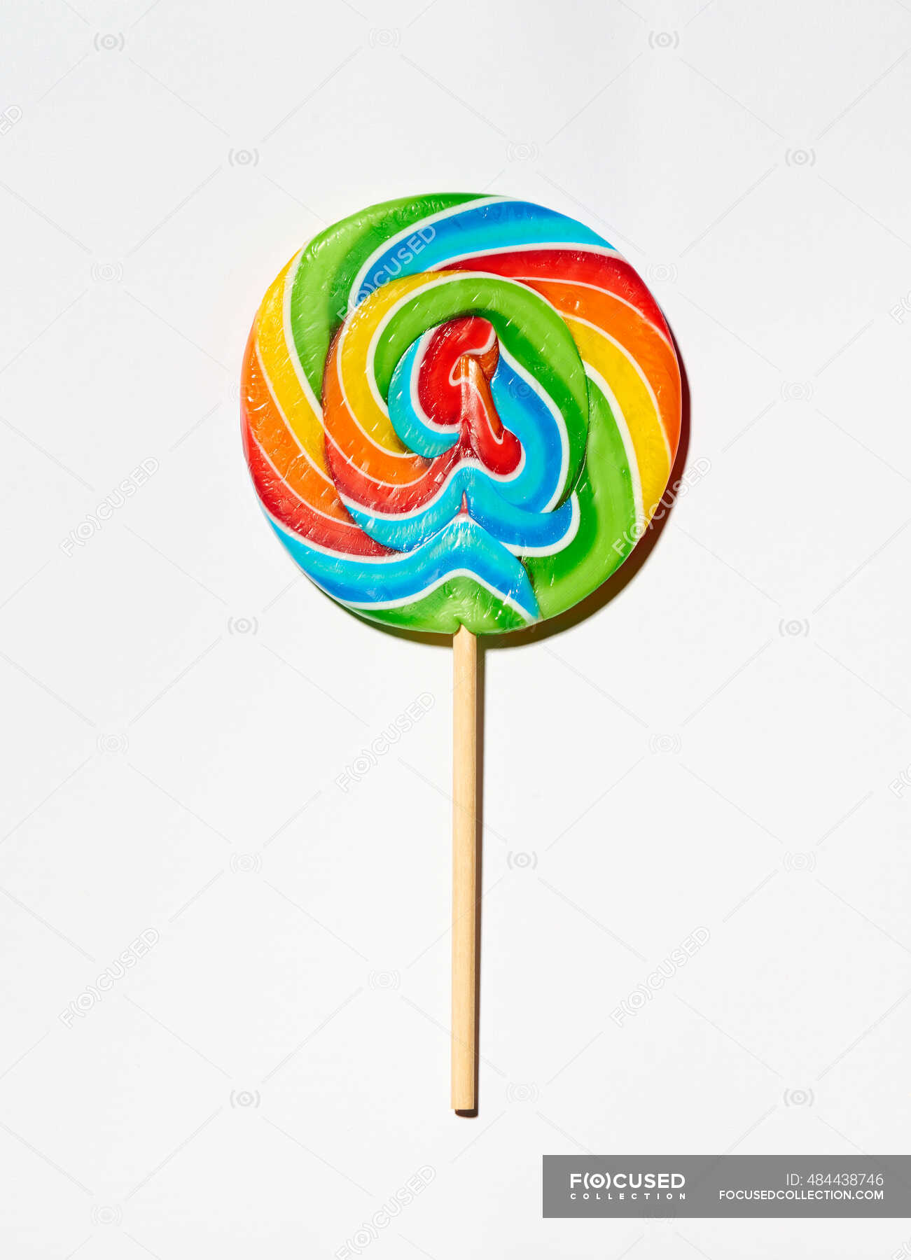 Ein bunter Lolli auf einer weißen Oberfläche — Lutscher, Lolly - Stock ...