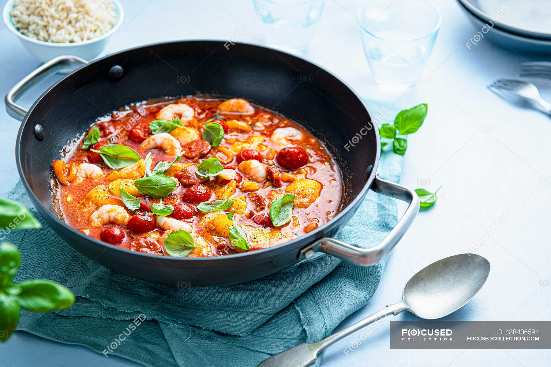 Mediterranean fish and prawn stew with chorizo sausage, cherry tomatoes