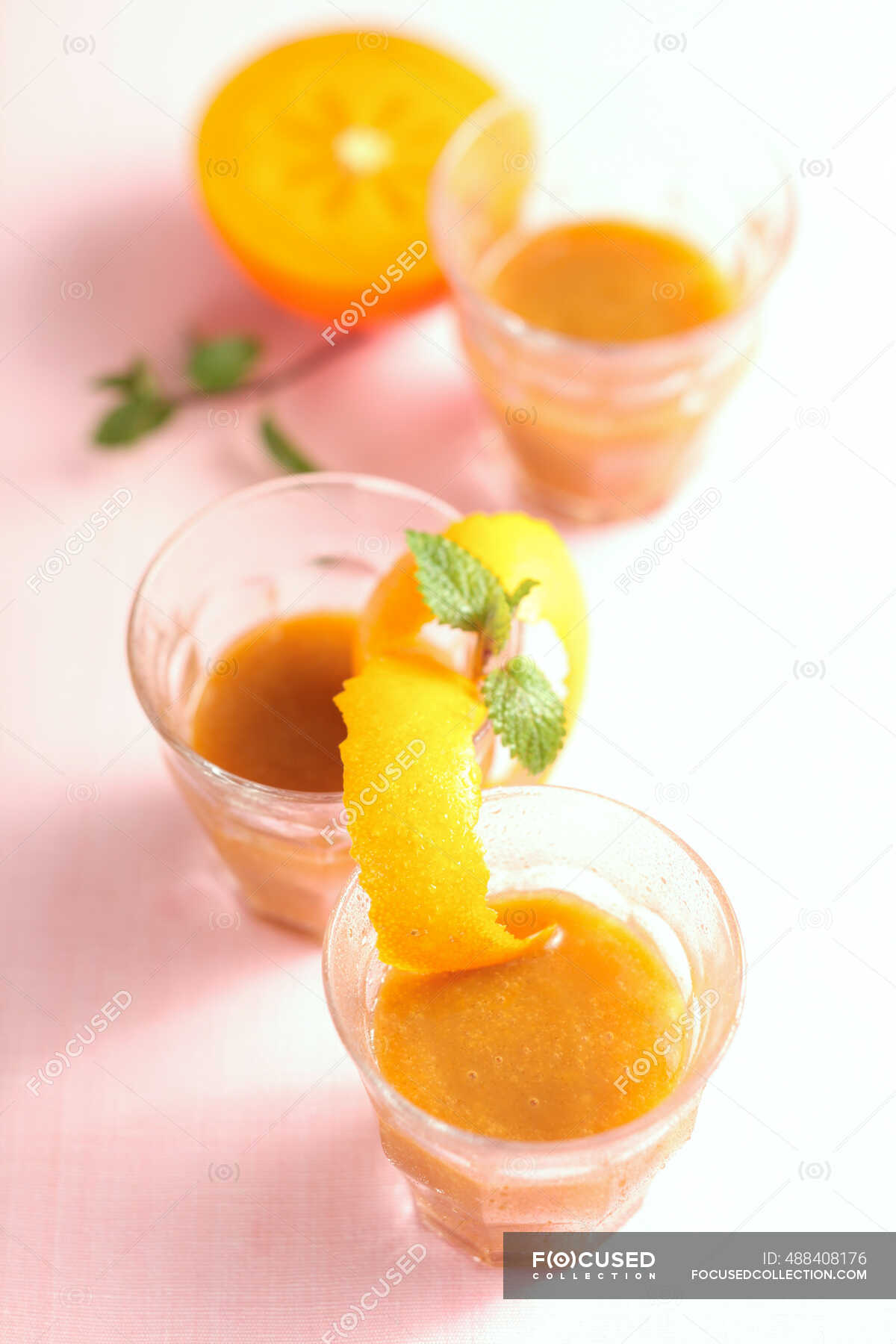 Persimmon and tamarillo smoothie with orange and ice — freshness, tasty -  Stock Photo | #488408176