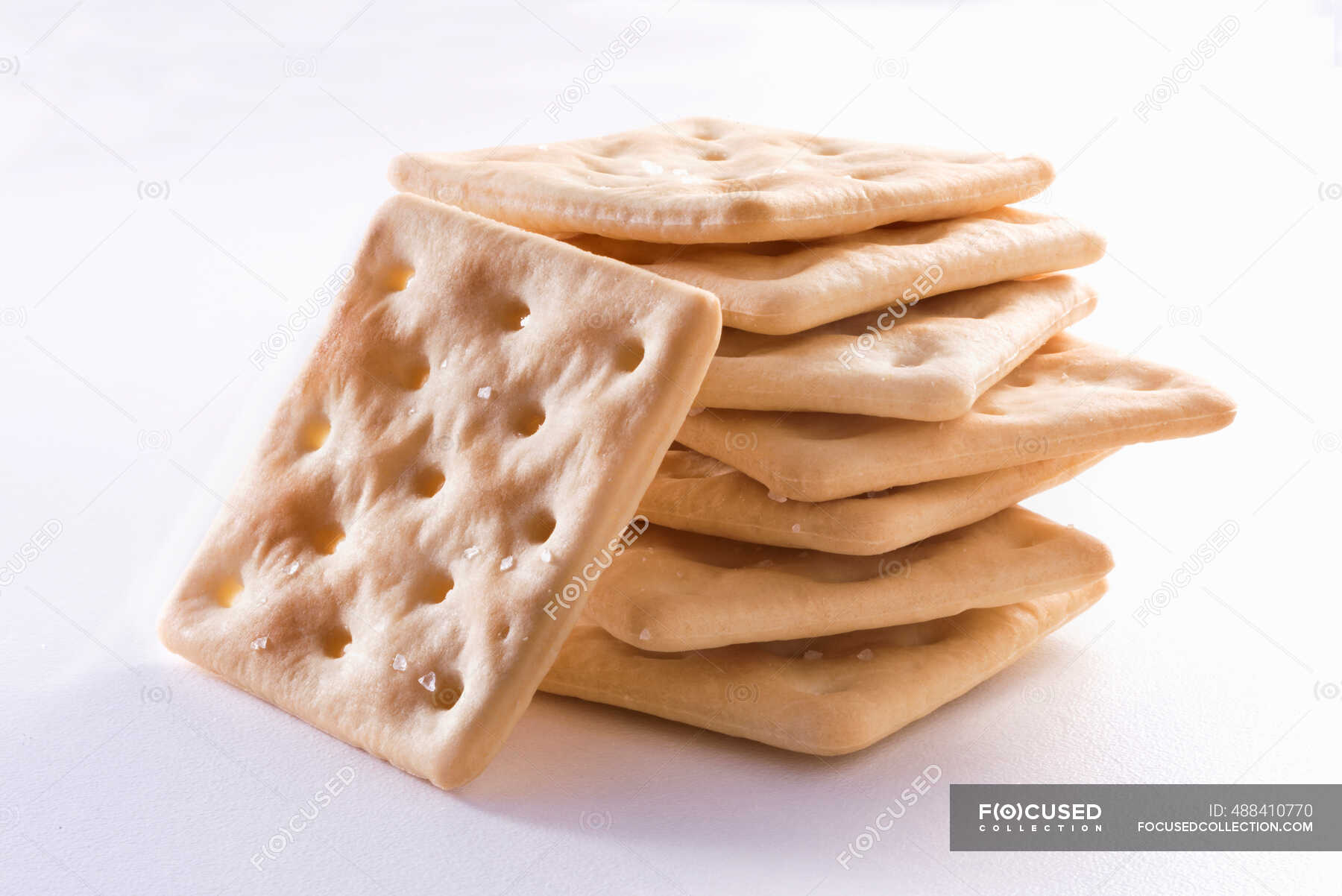 Gluten-free crackers on white background — clean, vegan food - Stock ...