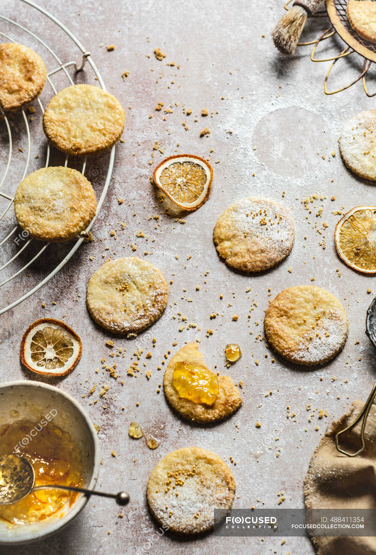 Orange cookies with jam and dried fruit slices — fresh cooked, homemade