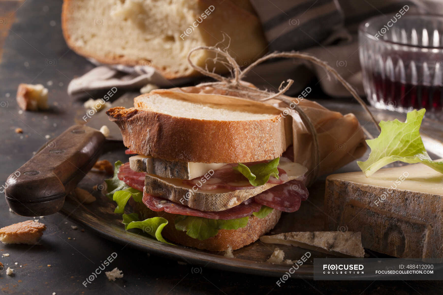 A salami and cheese sandwich — tasty, appetizer - Stock Photo | #488412090