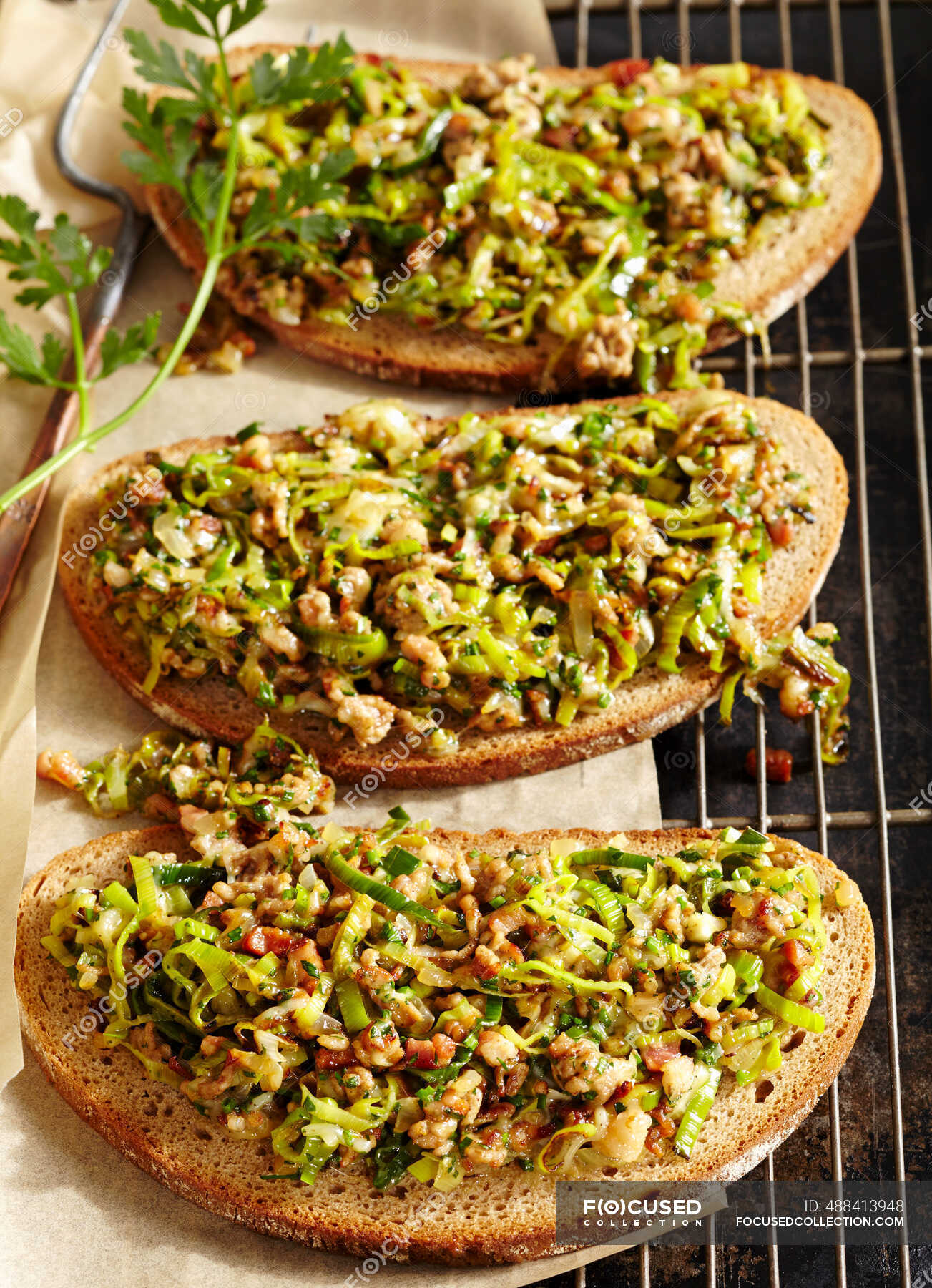 Minced venison and onion bread with butter, herbs, egg, gouda and