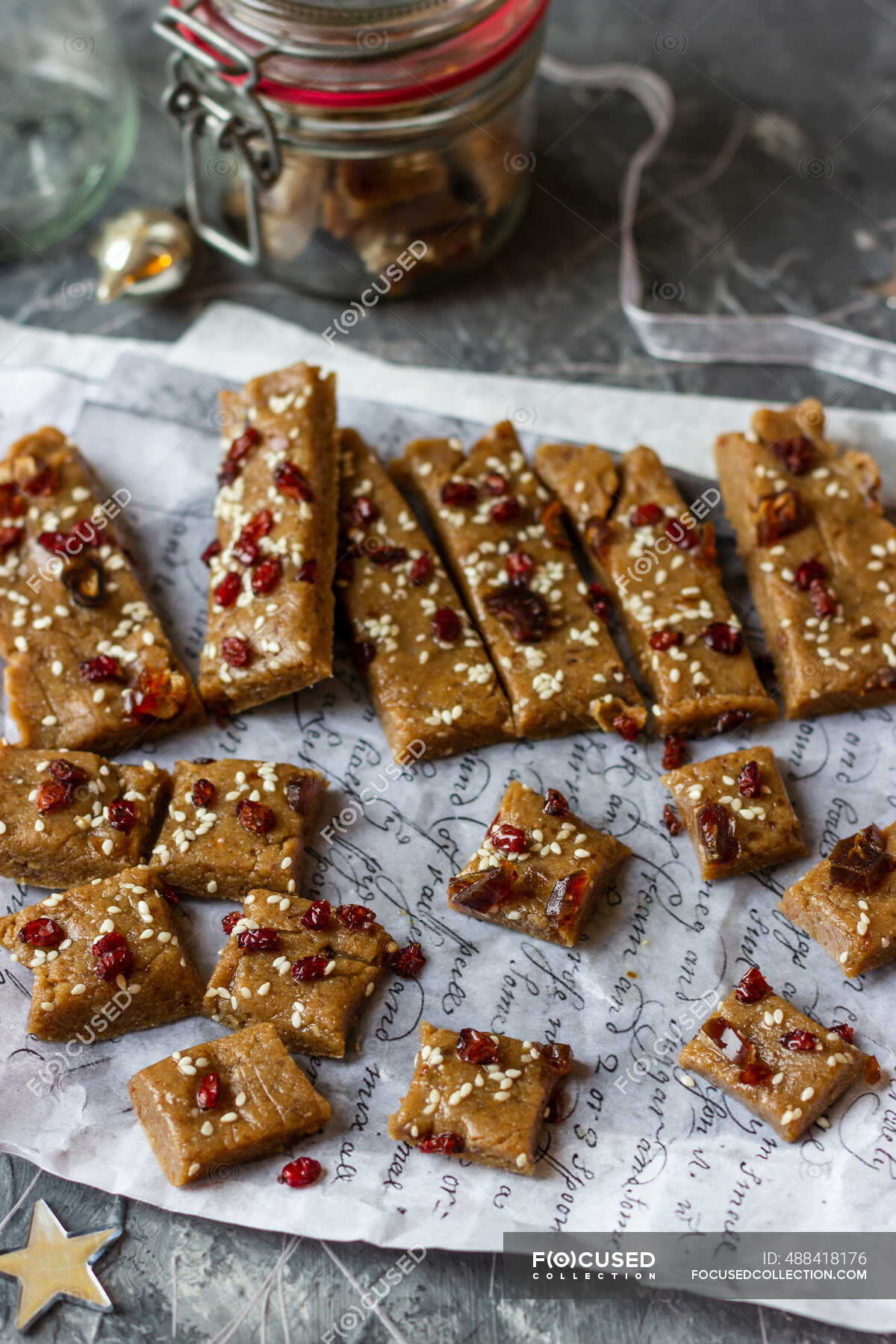Tahini and dates homemade bars with sesame seeds and cranberries