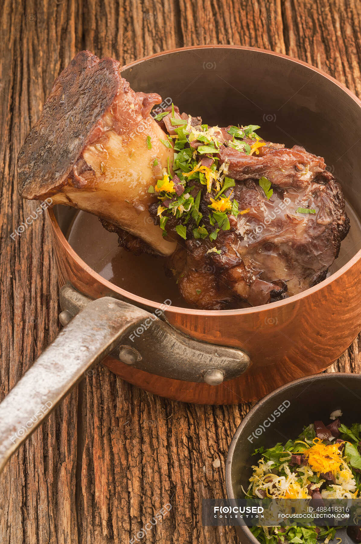 Slowcooked beef shank with gremolata — cuisine, recipe Stock Photo