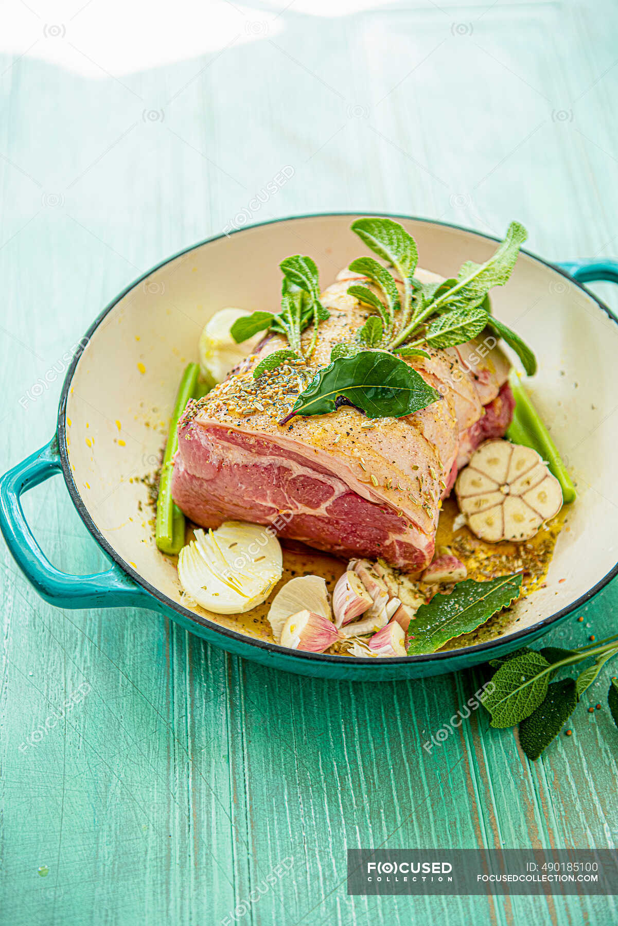 Pork shoulder ready to be cooked with sage, fennel seeds and garlic ...