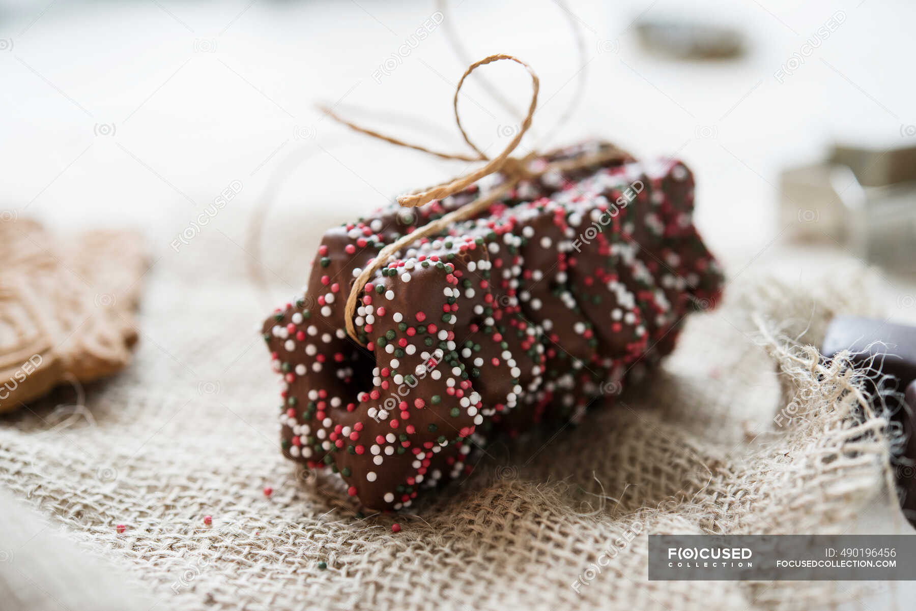 Lebkuchen stars with dark chocolate glaze — string, binding Stock