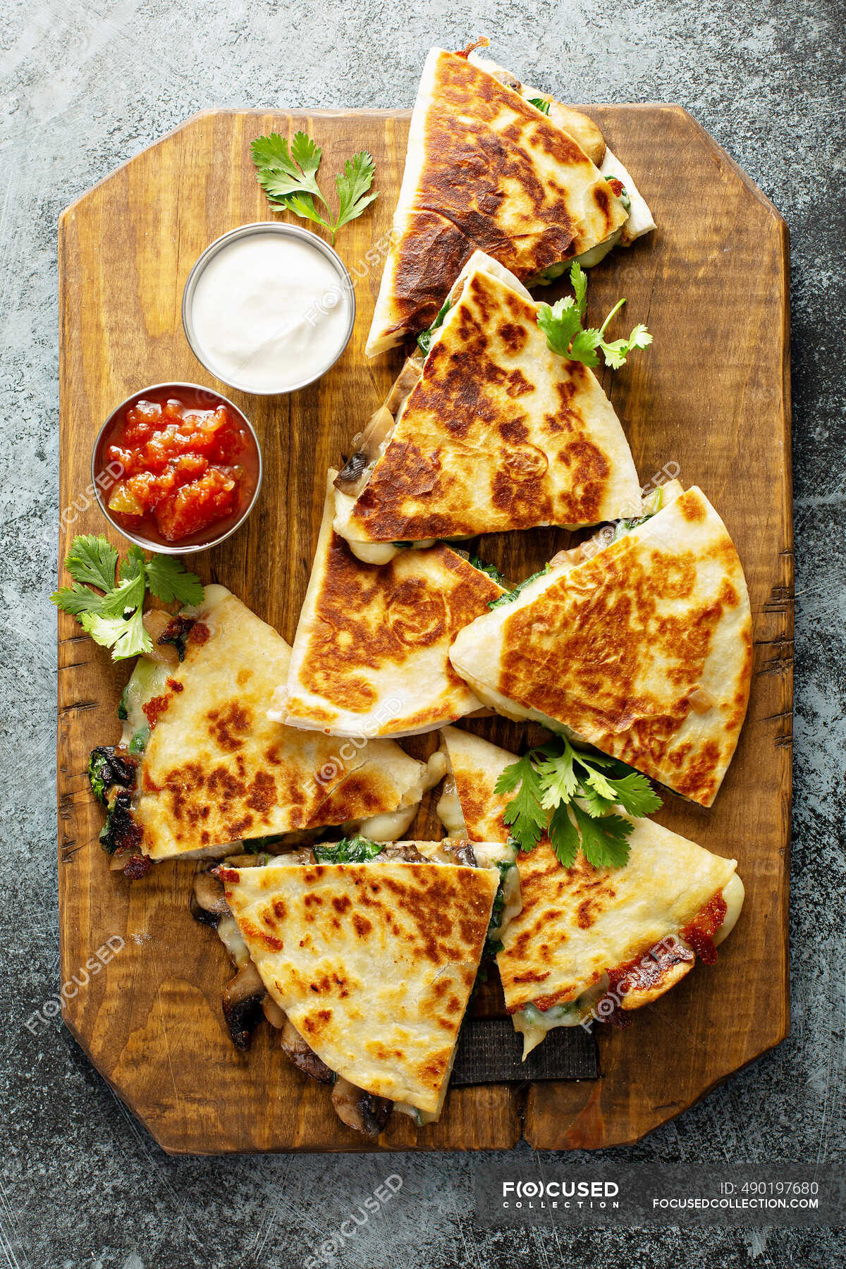 Mushroom, spinach and cheese quesadillas with sour cream and salsa — milk products, us cuisine