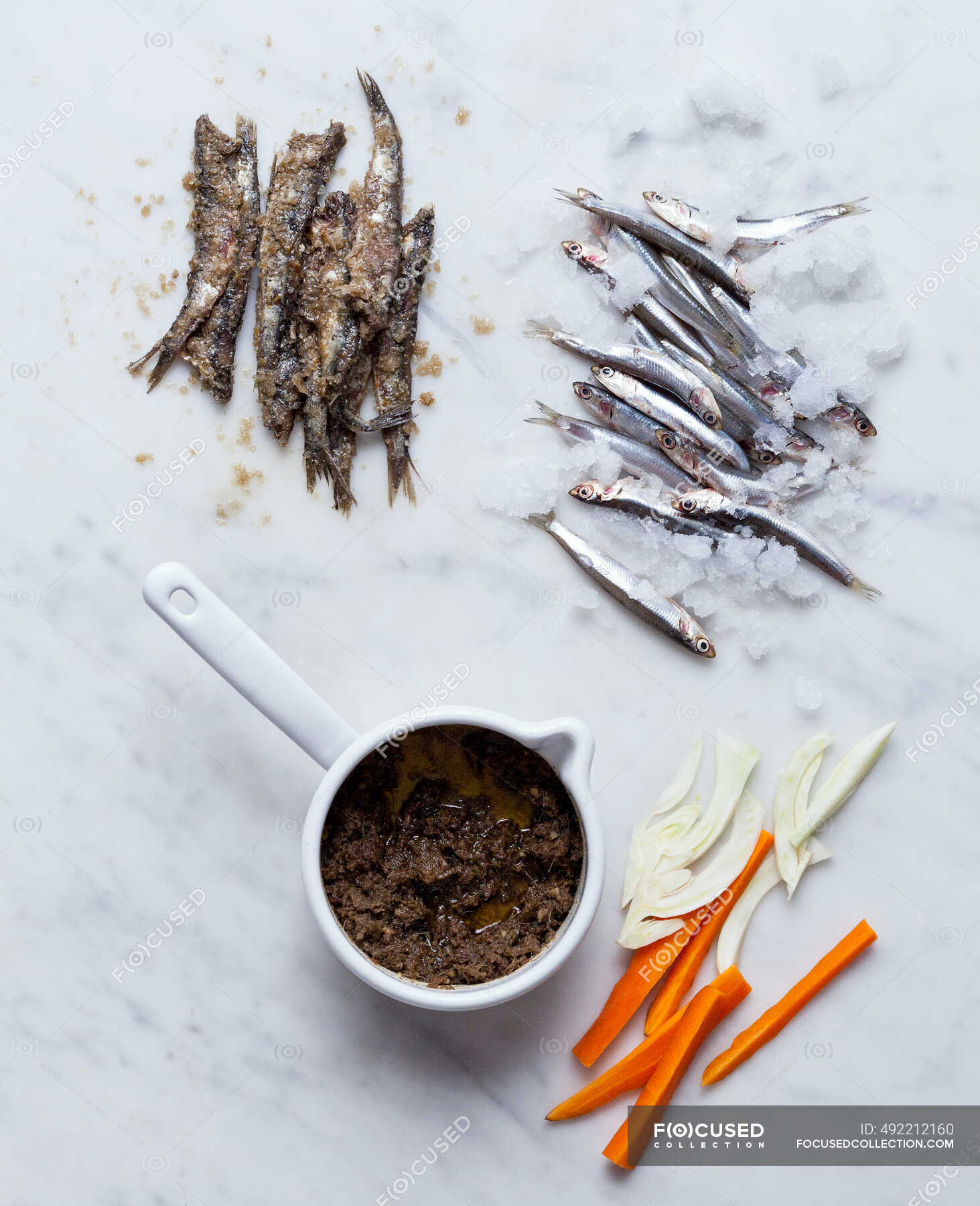 Anchovies and anchovy sauce — recipes, recipies Stock Photo 492212160