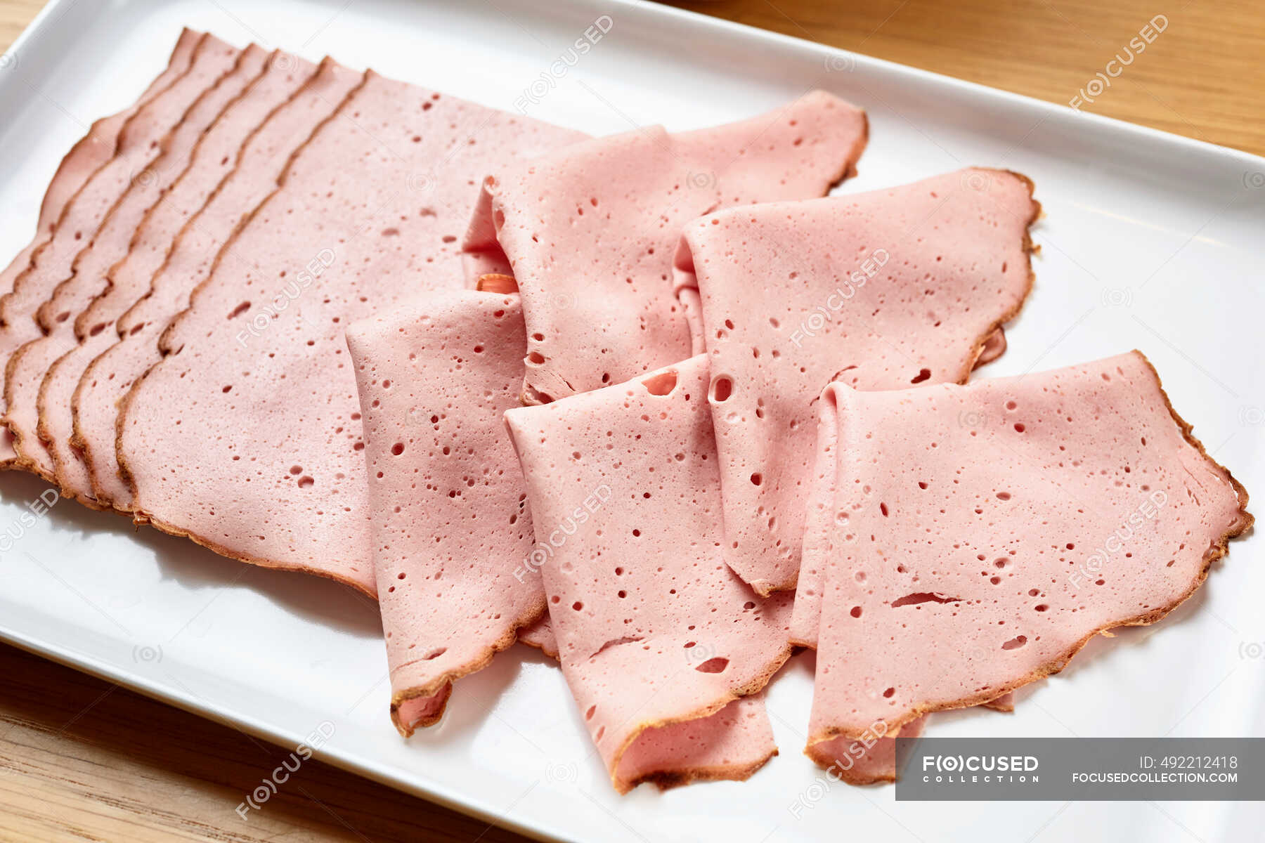 Sliced liver loaf on a plate — made, prepared - Stock Photo | #492212418