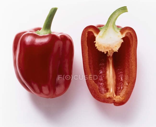 Red Bell Pepper with half — Stock Photo