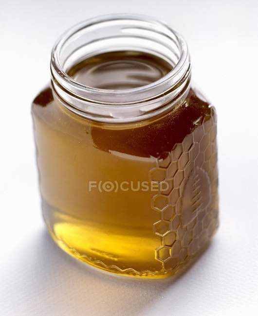Джар повний меду — стокове фото