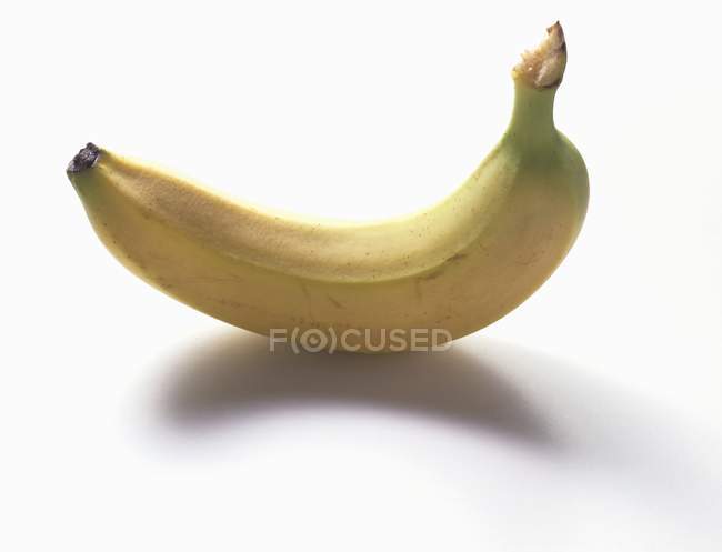 Primer plano Plátano entero - foto de stock