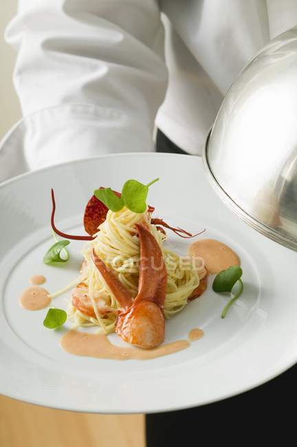 Plate of spaghetti with lobster — Stock Photo