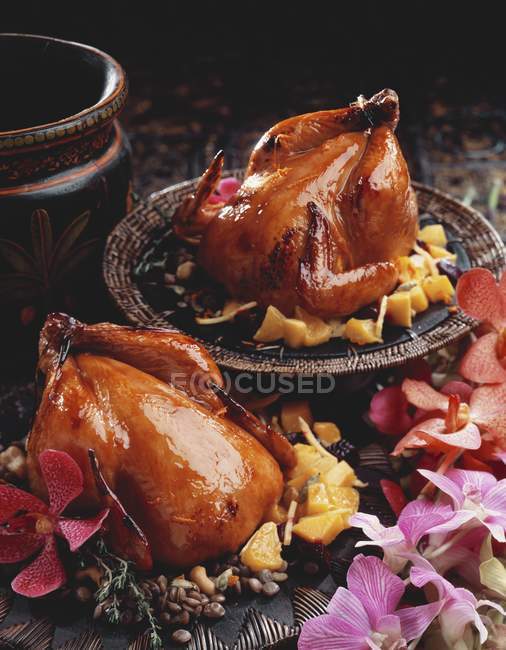 Closeup view of two citrus roasted chickens — Stock Photo