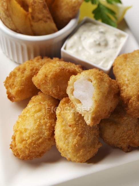Fish nuggets in heap — Stock Photo