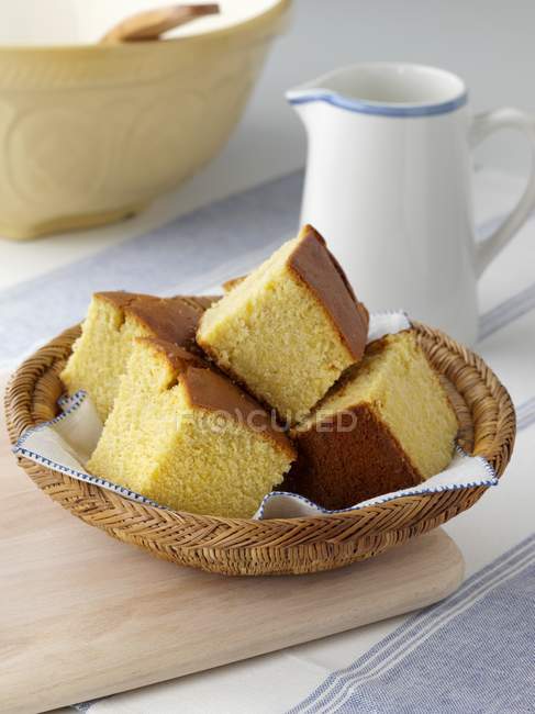 Cornbread pieces in basket — Stock Photo