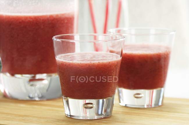 Berry smoothies in glasses — Stock Photo