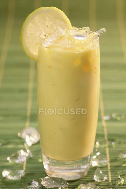 Closeup view of mango Lassi with lime — Stock Photo