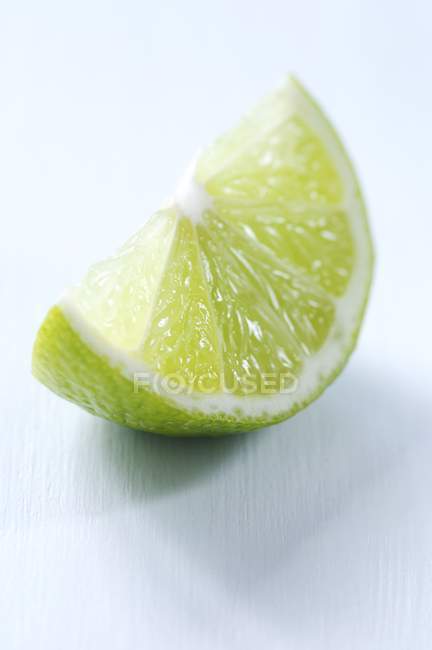 Closeup slice of lime — Stock Photo