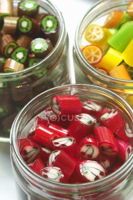Closeup view of handmade Papabubble bonbons in jars — Stock Photo