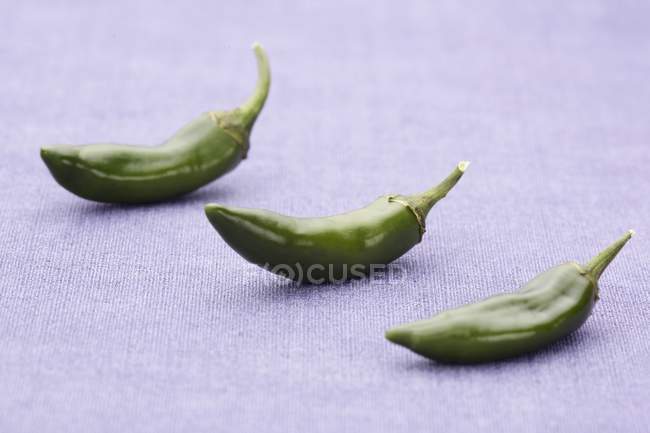Green chilies peppers — Stock Photo