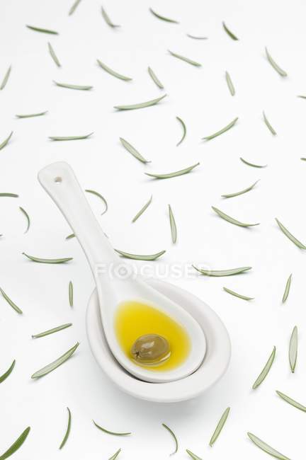Spoon of olive oil — Stock Photo