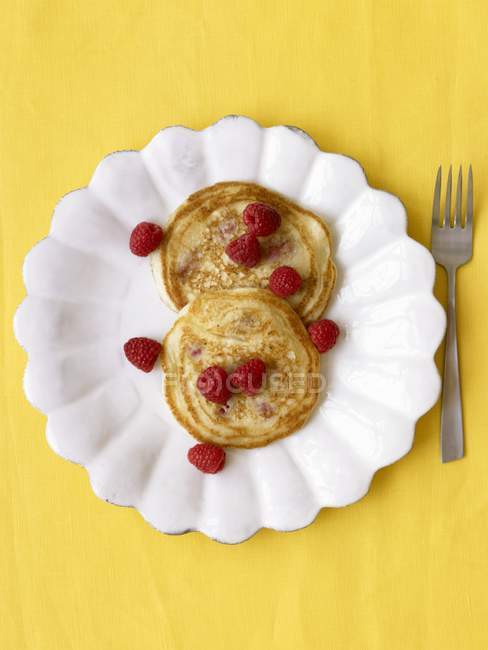 Two Pancakes with Fresh Raspberries — Stock Photo