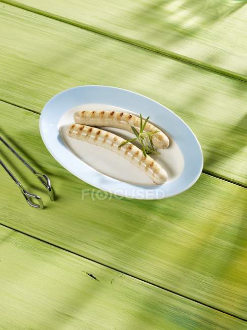 Grilled veal sausages — Stock Photo
