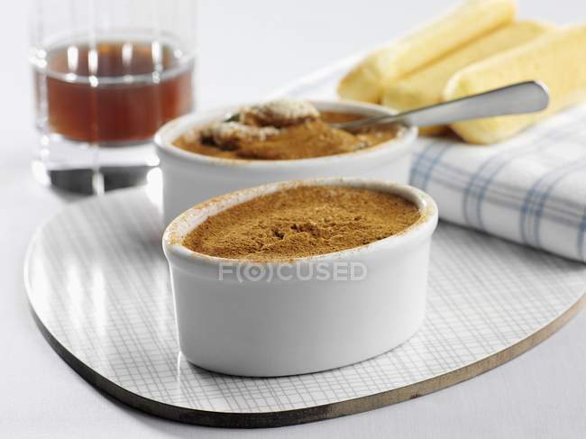 Closeup view of Creme caramel with cocoa powder — Stock Photo