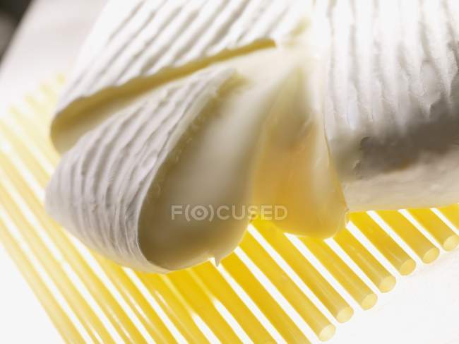 Sliced Brie cheese — Stock Photo