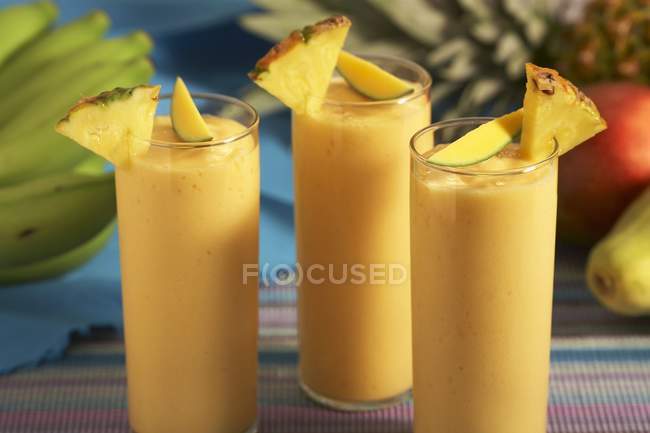 Papaya, Banana, Pineapple Smoothies — Stock Photo