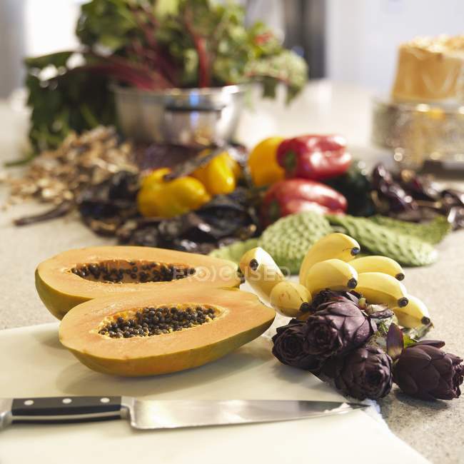 Tropical fruits on table — Stock Photo