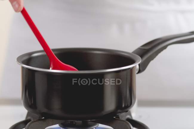 Closeup view of a saucepan on a gas stove — Stock Photo