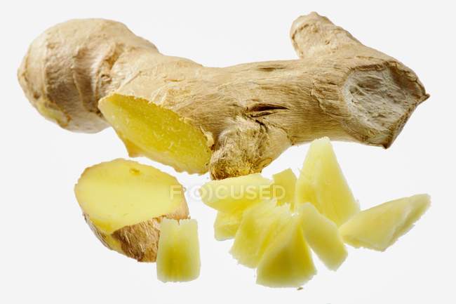 Fresh Ginger root with pieces — Stock Photo