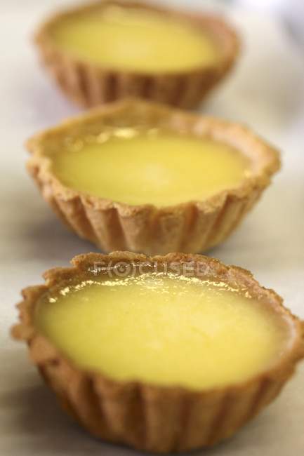 Three lemon tarts — Stock Photo