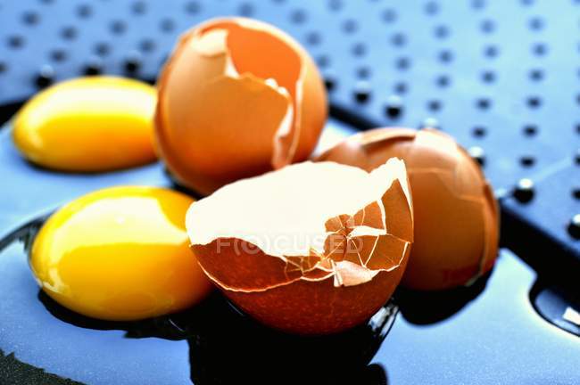 Raw eggs in glasses — Stock Photo