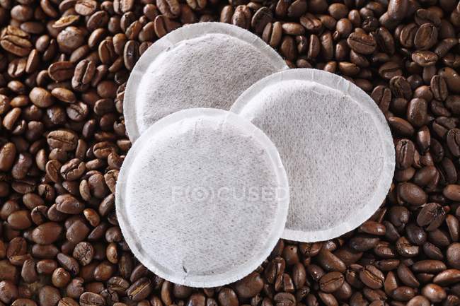 Three coffee pads — Stock Photo