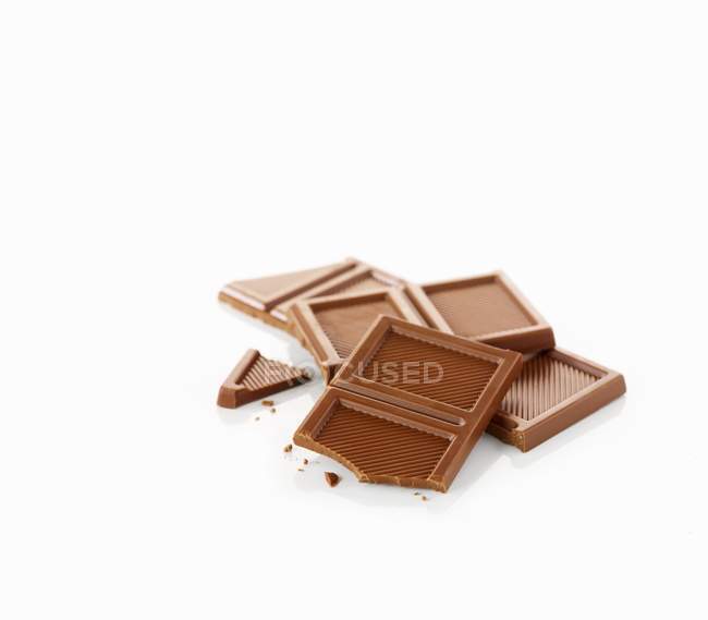 Pieces of milk chocolate — Stock Photo