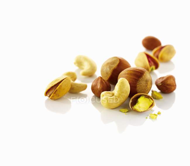 Hazelnuts with pistachios and cashews — Stock Photo