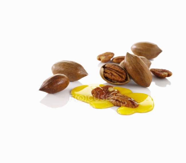 Shelled and unshelled Pecans — Stock Photo