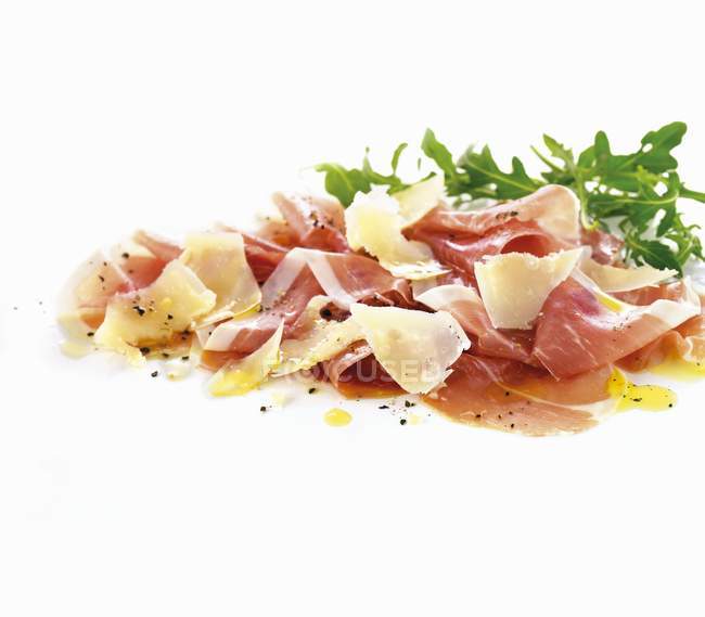 Prosciutto with Parmesan and rocket — Stock Photo